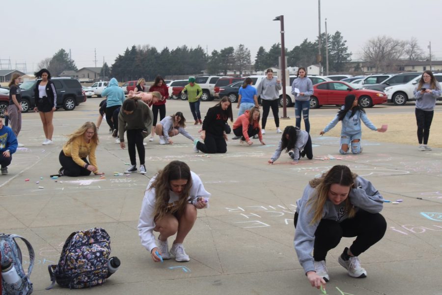 hays high students outside of hays high  main entrance on February of 2022
