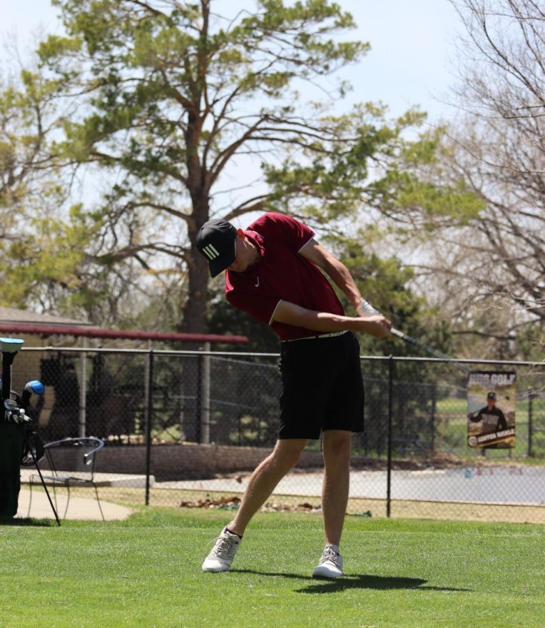 Freshman Trey Oakley tees on hole 1 at the Smoky Hill Invitational Tournament.