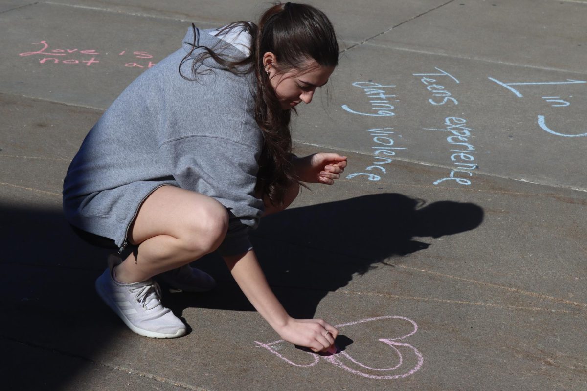 Options Student Advisory Board hosts Chalk about Love