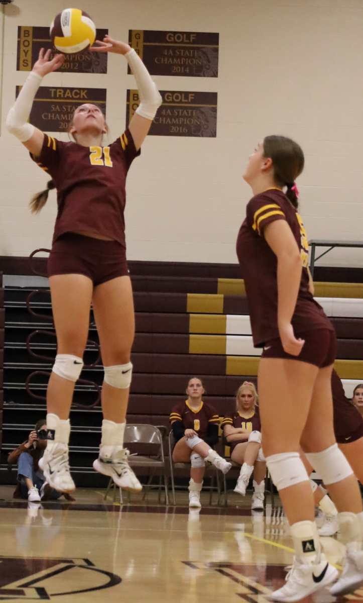 Brooke Bieker sets the ball for Molly Buckles at the Hays vs Philipsburg game.