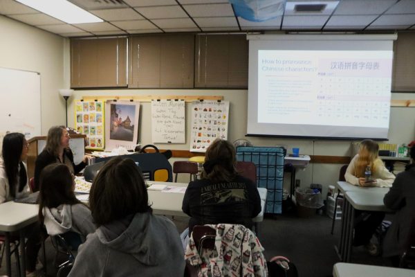 World Language Club members watch a presentation over one of the weekly language rotations.