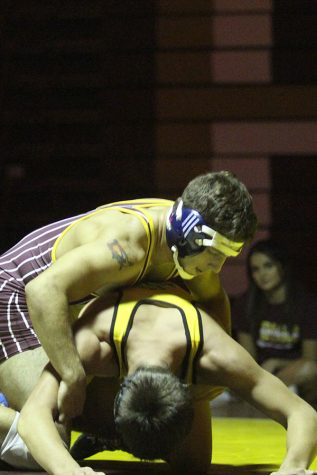 Wrestling takes first at Topeka