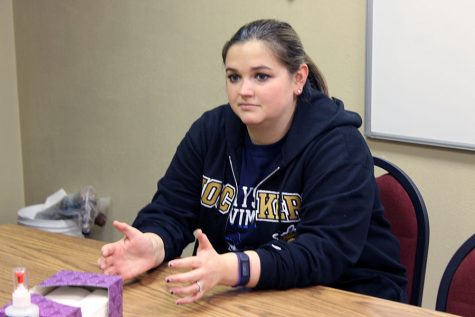 New girls swim coach plans to promote team bonding