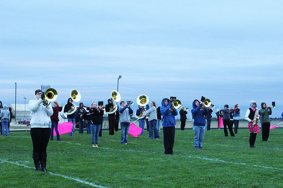 Students+in+marching+band+practice+their+show.+