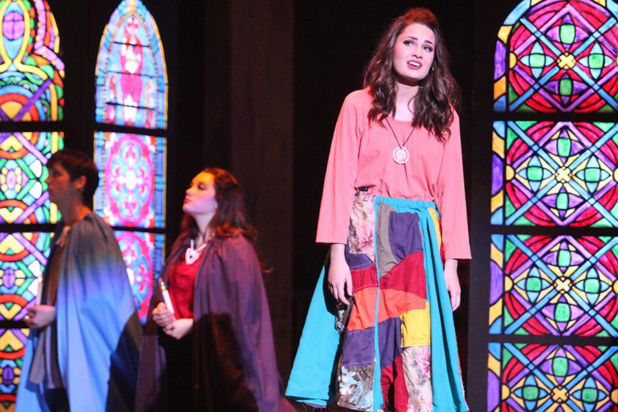 Gypsy Esmeralda (senior Erin Muirhead) sings in the Cathedral asking for God to help the outcasts (God Help the Outcasts). She enters the Cathedral after watching Quasimodo (senior Ryan Will) get beaten. She believes it is her fault he was whipped and is trying to find him to apologize.