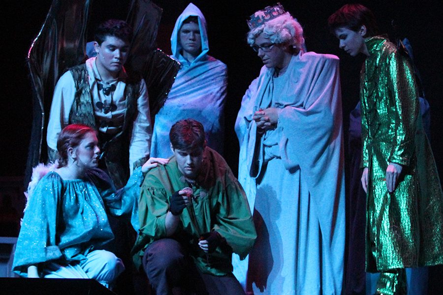 Quasimodo (senior Ryan Will) talks to the statue of Saint Aphrodisius (senior Dusty Schneider) who, along with the three gargoyles Laverne, Victor, and Hugo (seniors Sarah Wyse, Michael Hernandez, and Dawson Rooney) guide him on what to do. They help him figure out the puzzle Esmeralda (senior Erin Murihead) left him. They also convince him to go after her and help her (Flight into Egypt). A statue (sophomore Nathan Leiker) stands in the background.
