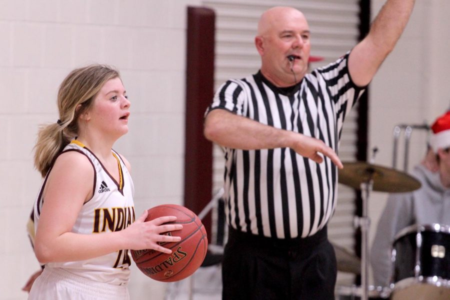 Junior Mattie Hutchison looks for an open player to throw the ball in bound to in a recent game against the Colby Eagles. The Lady Indians beat the Eagles 44-19.