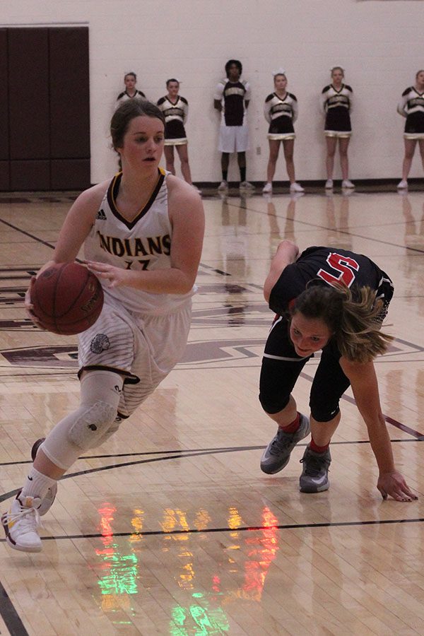 Sophomore Brooke Denning fakes out Liberal defender and drives to the hole for an easy lay up in a recent home match up at home.