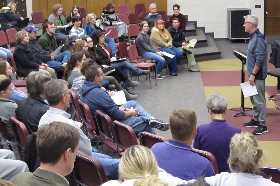 Instructor Johnny Matlock holds his annual Dinner Show meeting with the parents of students in Chamber Singers. The meeting is normally held earlier in January but had to be moved back on account of a new development.