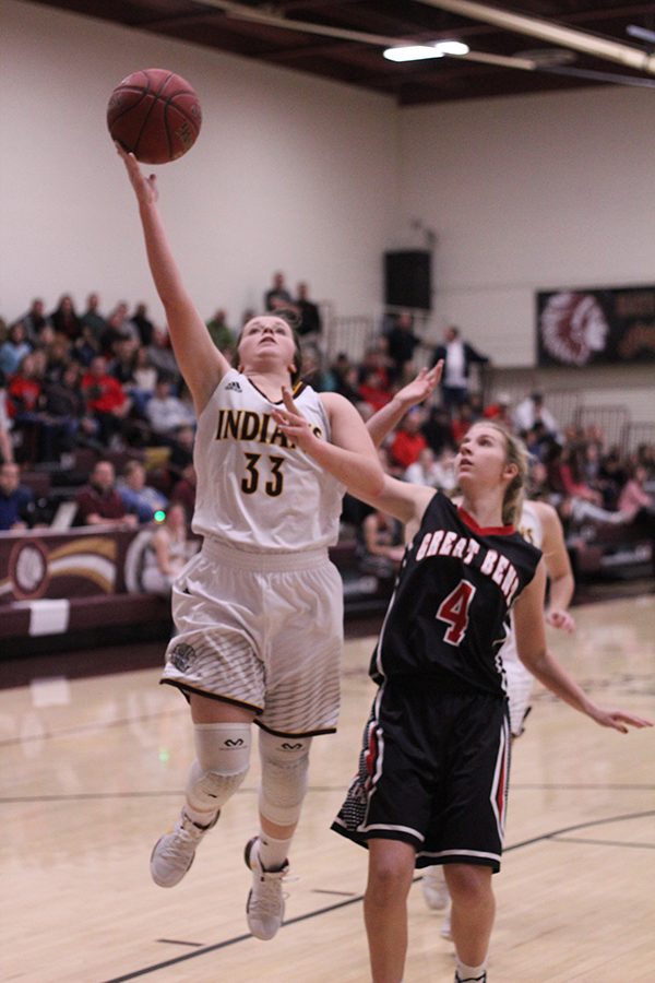 Sophomore Brooke Denning goes up for a shot in a recent game against Great Bend. On Feb 16, the Lady Indians basketball team lost to Garden City.