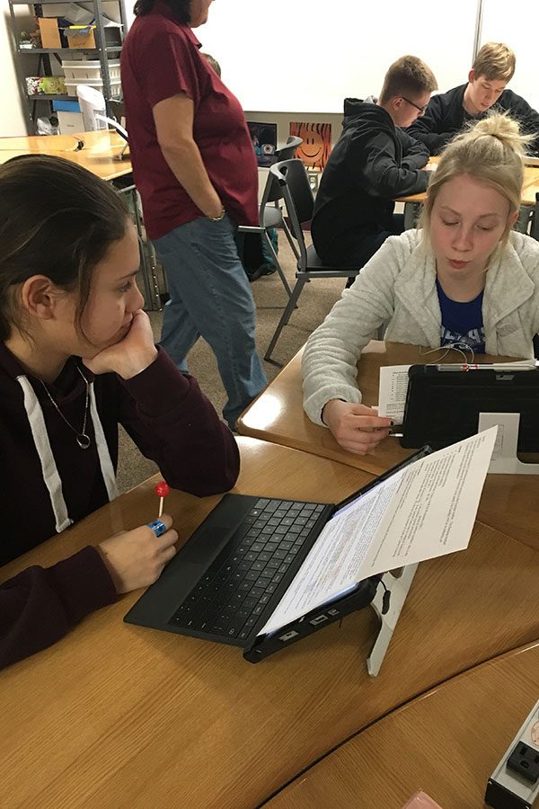 Sophomores Dellilah Herrera and Ashton Tabor preparing for the student led conferences 
on Feb. 23