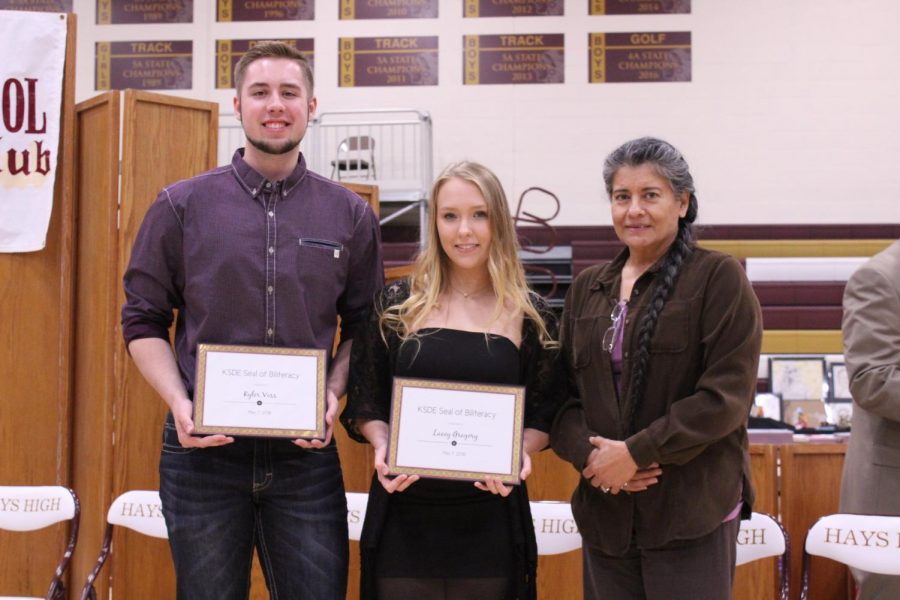 Seniors Kyler Voss and Lacey Gregory received the KSDE Seal of Biliteracy. They were recognized for having attained proficiency in English and one or more other language by the time they graduate.