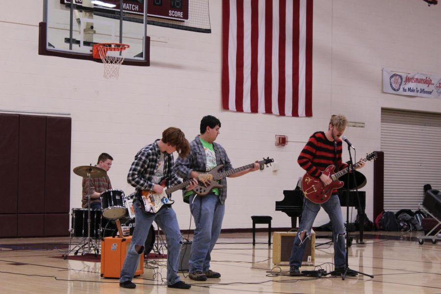 Juniors Calvin Duden, Garrett Cole, Jackson Stanton and Spencer Wittkorn perform an original song.