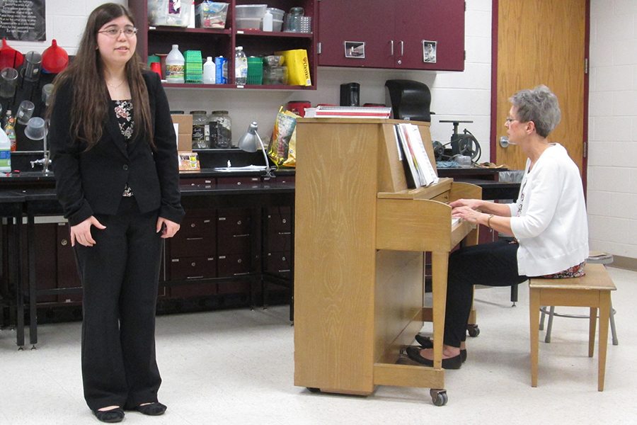 Senior Kayla Satomi performs her two selected pieces of music for a judge in Larned. Kayla was one of many students with a high enough rating at regional contest to make state.