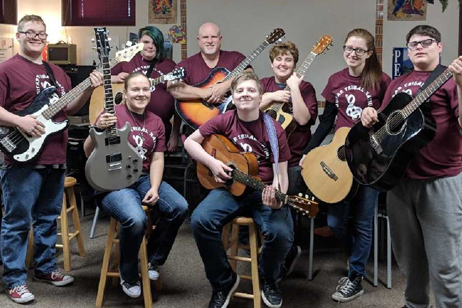 Rather than having one guitar club group it was split into two-- advanced and beginner.