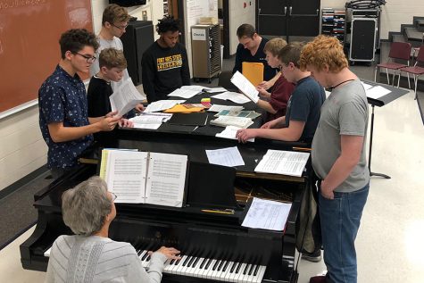 The tenors and basses rehearsing their District auditions with Alex Underwood during a seminar practice.