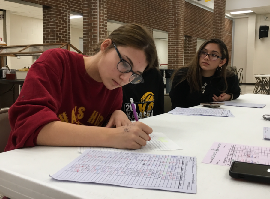 Sophomore Trinity Carrasco signs up for a dodge ball committee. Each committee is responsible for a different part of the tournament such as music, decorations, concessions or publicity.