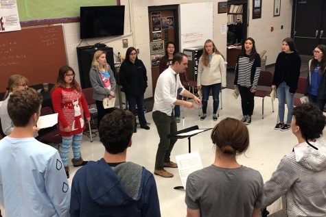 The Chamber Singers practice for the Cathedral Concert.