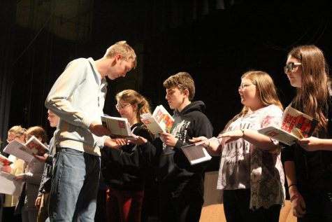 Mr. Gilbreth, played by senior Calvin Duden, lectures his children.