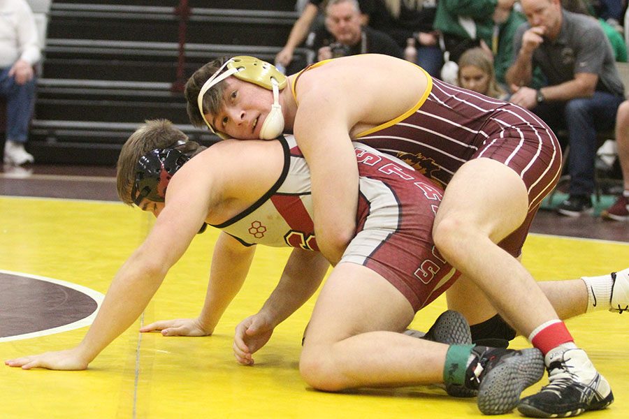 Senior Chase Voth wrestling at home for the Bob Kuhn. He is one of the six who qualified for state this past weekend. 