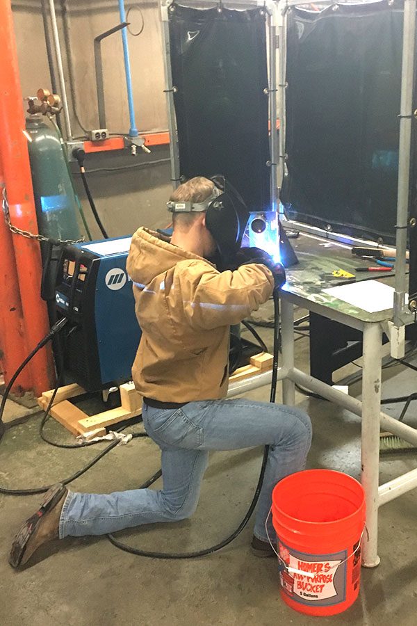 Senior Kyle Casper works during the welding competition on March 1. Casper placed in the top 50 out of 102 competitors. 