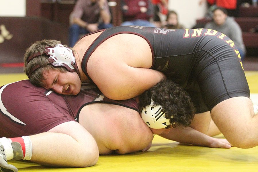 Senior Logan Schulte wrestling at the Bob Kuhn Prairie Classic. He was one of the two that placed at state.