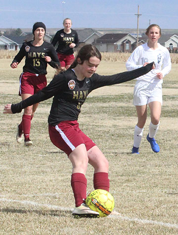 Sophomore Maggie Robben takes shot just outside the  box, against crosstown rivals, TMP Marian. The Lady Indians won the game 7-1.