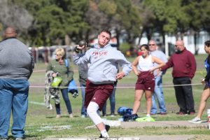 Senior Chase Brous gets ready to throw a shot put at a track meet held in Larned. The track team placed second at the Great Bend Varsity Invitational.