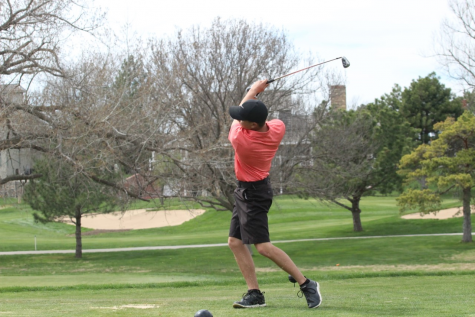 Senior Josh Norris golfs at a previous home tournament. The team is now headed to its 11th straight state championship.