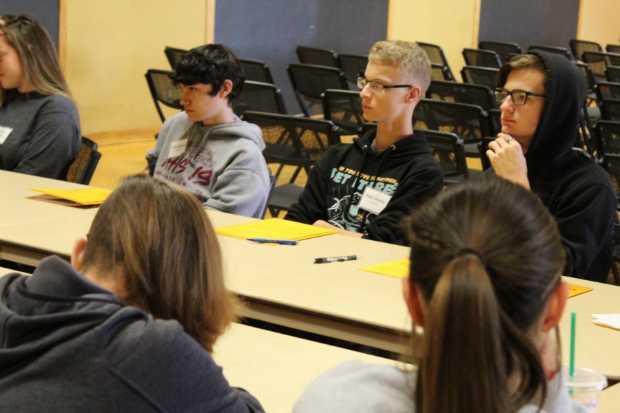 Seniors Jace Hesford, Noah Oborny, Elliot Hoar participate in a small group afternoon session for Philosophy Day. The event took place on Oct. 9 at Fort Hays State University in the Memorial Union. 