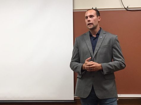 Real estate agent Robert Munsch talks with students about his career during PRIDE Time