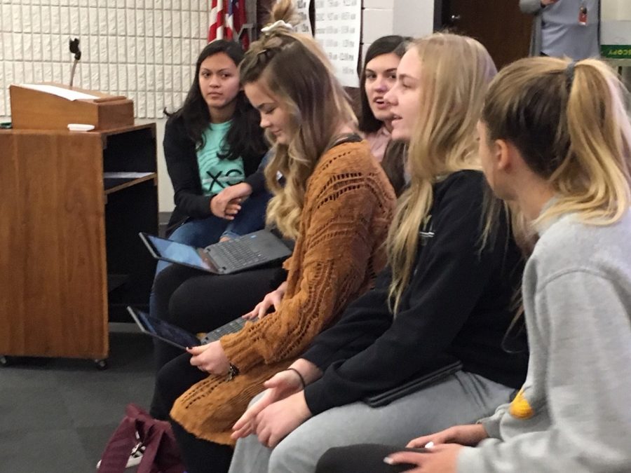 StuCo Public Relations Officer Kaylor Meyers reads notes off of her computer during the Oct. 21 meeting. Meyers discussed possible changes to Indian Call.  One suggestion was to combine Indian Call with TMPs winter formal. 