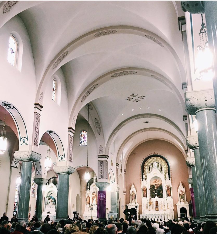 Audience members pack the Basilica of St. Fidelis before the start of the concert. The Basilica is commonly referred to as the Cathedral of the Plains and is 108 years old.  It is also considered to be one of the eight wonders of Kansas.