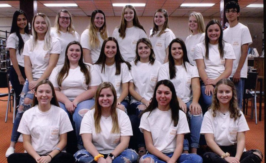 The 2019-2020 Indian Call staff poses for a picture. The staff pictured above along with adviser Bill Gasper worked on the edition of the Indian Call which has now been given the title of All-Kansas Yearbook.