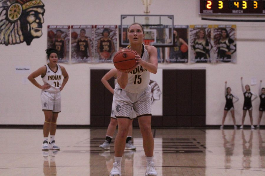 Junior Brooklyn Schaffer shoots a free throw in a home game during the Shootout in December. 