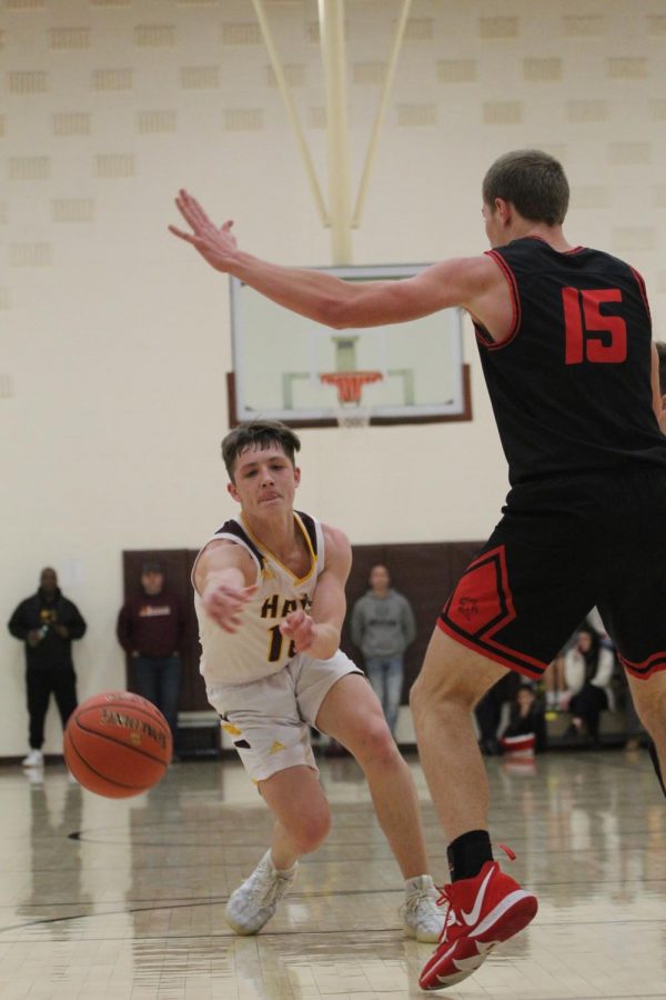 Sophomore Noah Weimer passes the ball during the home game against Great Bend on Jan. 14. 
