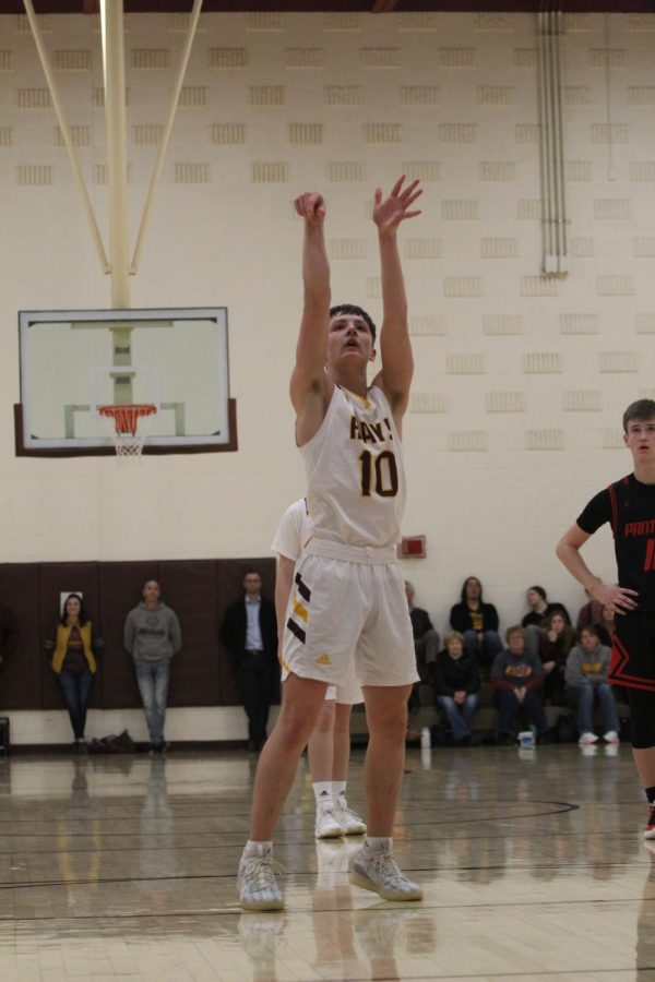 Sophomore Noah Weimer shoots a free throw during the home game against Great Bend on Jan. 14. 