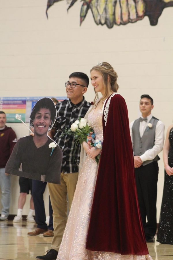 Seniors DeVontai Robinson and Moriah DeBey won Indian Call King and Queen. Senior Derrick Aragon stood in for Robinson because he was at regional wrestling competition.