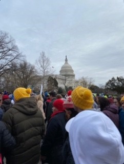 Students stand in crowd waiting at March for Life.