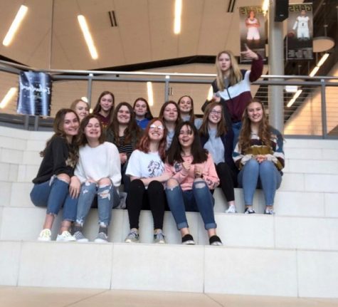 Art students pose for a picture after setting up for the art show in Garden City. Students traveled to Garden City on Feb. 26 to help set for the WAC Art Show.