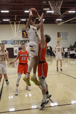 Boys Basketball comes back to win first round of substate