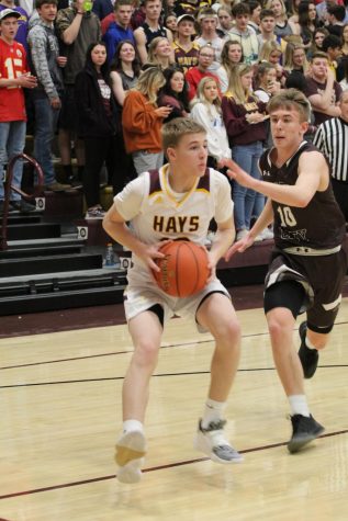 Boys basketball heads to state tournament with win over Great Bend