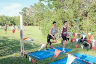 Sophmore Landon Viegra races at the Great Bend Invitational Meet on August 30, 2019, before the COVID-19 outbreak. Cross Country is one of his motives for staying in shape during quaratine.