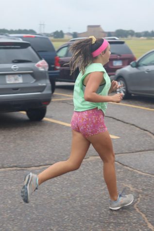 Sophomore Ashlyn Hammerschmidt runs toward the finish line at the end of the mock meet.
