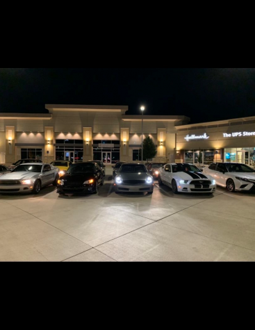 Around 20 cars usually participate in cruise nights. They start the night by meeting in the parking lot of Tebo Village.