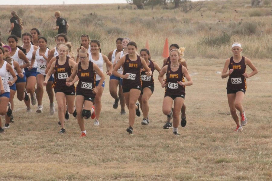 The WAC meet was in Liberal. The boys ran 5,000-meter race, and the girls ran a 4,000-meter race.