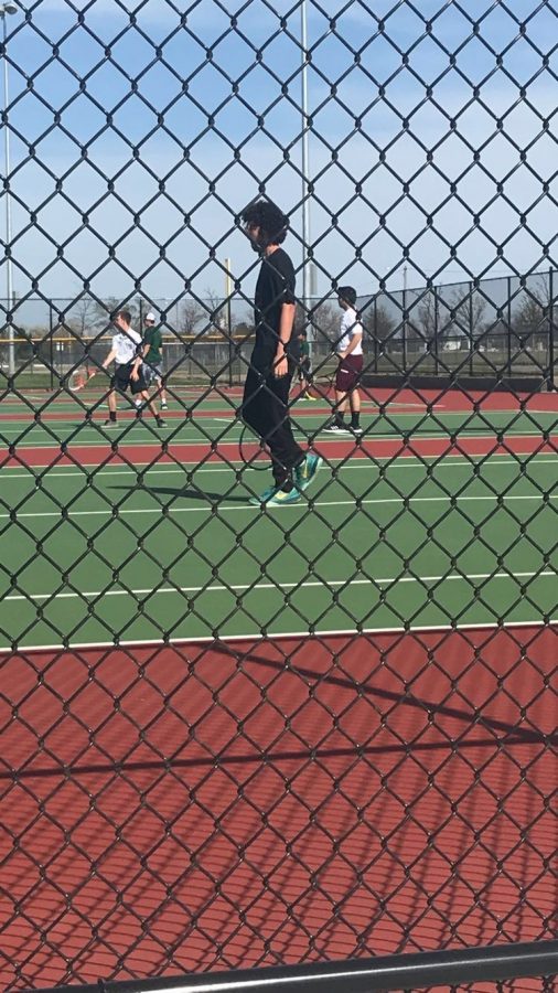 The Boys varsity tennis team competes at Salina South and Garden City against tough competitors.