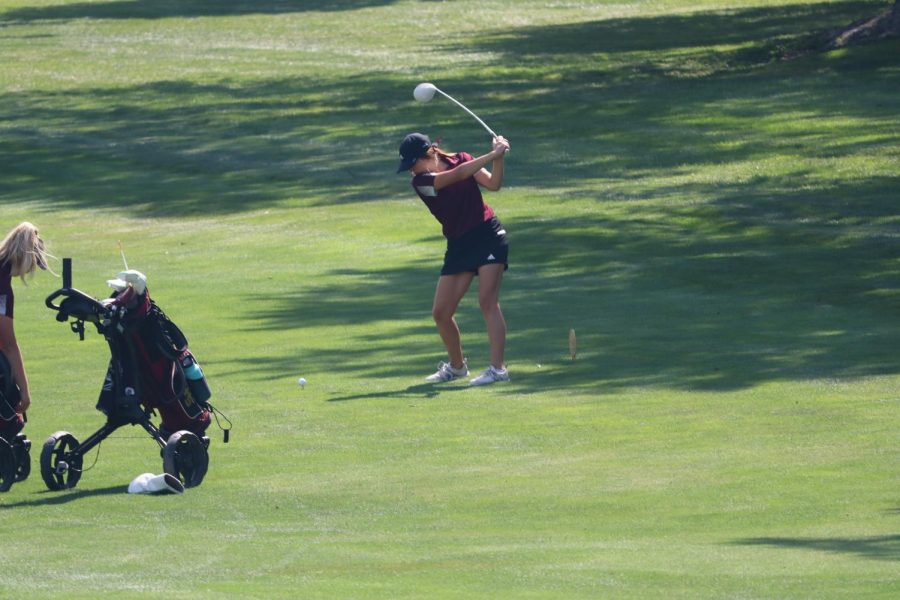 Junior+Aspen+Melvin+hits+her+driver+at+the+Hays+High+Invitational+Tournament+at+Smoky+Hill+Country+Club.