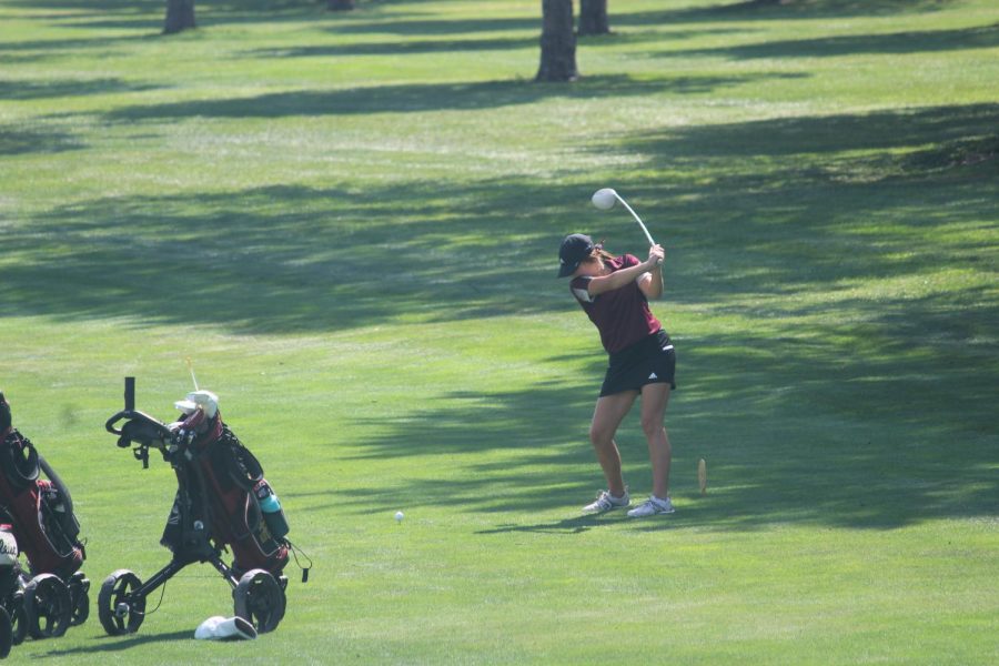 Junior+Aspen+Melvin+hits+her+tee+shot+on+hole+2+at+the+HHS+golf+tournament.