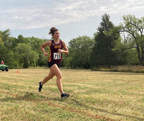 Junior Amelia Jaeger races at the Great Bend meet on September 2. Jaeger finished third at the Hesston meet with a time of 24:03:00.